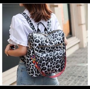 Gray leopard backpack bag